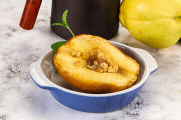 Baked quince with honey and cedar