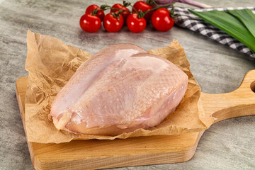 Raw chicken breast with bone