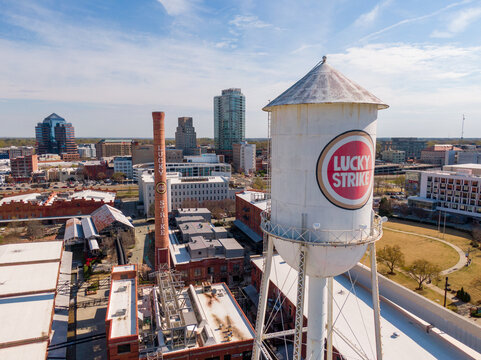 March 28, 2024: Durham, NC, USA - Stock Drone Images of the Durham Bulls Athletic Park in Downtown Durham North Carolina on a Sunny Day: Sports, Cityscape, Tourism