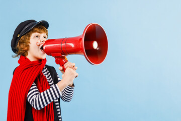 Cute boy in mime costume shouting in megaphone on light blue background, space for text. Surprise...