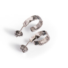 A watercolor vector painting of minimalist gold hoop earrings, isolated on a white background. Minimalist gold hoop earrings vector.