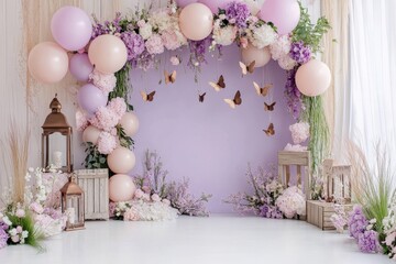 Pastel purple backdrop with balloon garland lanterns and flowers