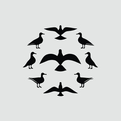 Vector silhouettes set of birds at tree branches  and isolated background.