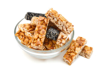 Peanut bars with nuts isolated on white background.