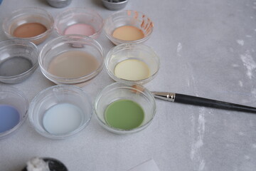 Painting colours for azulejos tile painting workshop with brush