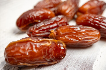 dried dates on a white background