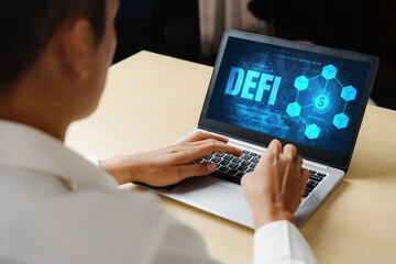 Decentralized finance or DeFi concept on modish computer screen . The defi system give new choice of investment and money saving .