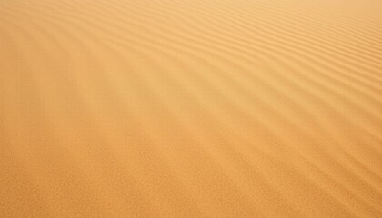 Naklejka premium Golden sand ripples form an abstract wave pattern across the dry desert dunes