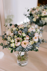 Pastel flower bouquet with mirror reflection.