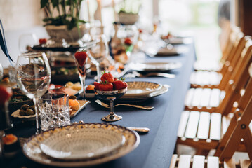 Elegant dining table setup with fresh fruit for a special gathering in a cozy setting