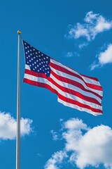 Obraz premium Flag Waving Against Blue Sky with Clouds Sunny Patriotic Image