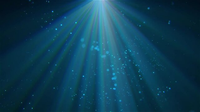 Light rays from top and floating particles in air mist or steam. Overlay special vfx ambient effect animation for atmospheric videos or underwater scenes or stage spot light effect.
