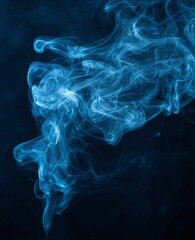 Fototapeta premium Smoke effect on a black background, in shades of blue and white, stock photo