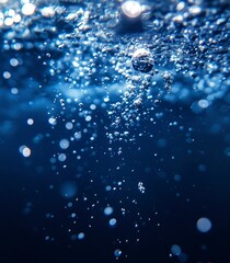 Fototapeta premium Water bubbles rising from the bottom of an ocean, dark blue background, glowing light in the top right corner, high resolution, high quality, high detail, hyper-realistic, photorealistic, sharp photog