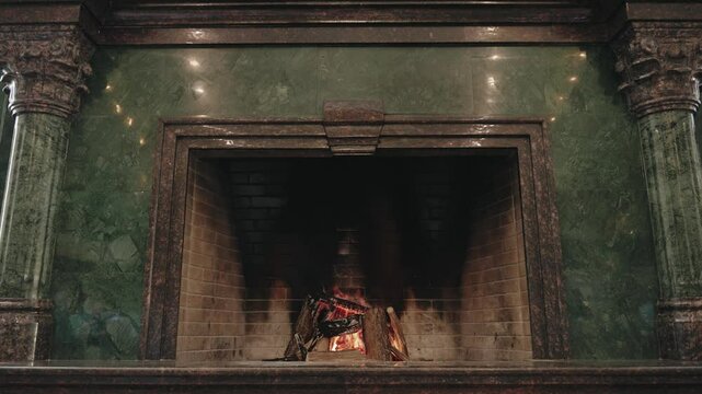 Wood is burning in the beautiful vintage fireplace