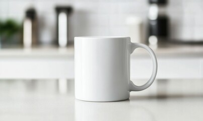 A crisp white mug sits elegantly on a kitchen counter, ready for your custom design or logo.