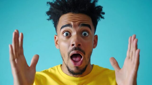 Amazed mixed race man shocked saying WOW.