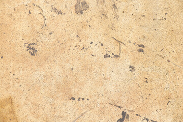 Beige dirty old leather upholstery with stains and scratches on chair as background