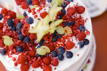 White Luxury Wedding Cake with Forest Berries – Elegant, Light, and Diet-Friendly