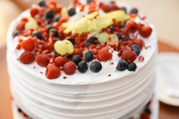 White Luxury Wedding Cake with Forest Berries – Elegant, Light, and Diet-Friendly