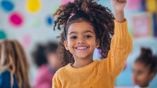 Enthusiastic Elementary Student Raising Hand in Classroom, Concept: Education, Purpose: Stock - Powered by Adobe
