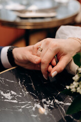 hands of bride and groom