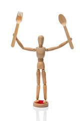 Wooden toy mannequin  holding disposable wooden fork and spoon on a white background.