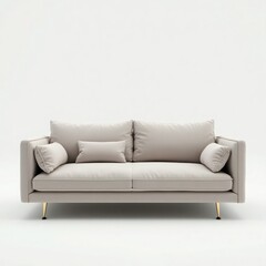 Fototapeta premium Stylish modern beige sofa with plush cushions and sleek golden legs, perfect for contemporary living spaces.