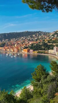 Panoramic view from above of turquoise sea, colorful houses, marina and waterfront Villefranche-sur-Mer Cote d'Azur France, Provence, Alps. High quality 4k footage