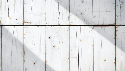 Whitewashed wooden planks, bathed in the warm glow of sunlight streaming through a window, showcase a rustic yet elegant texture.