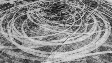Car tire marks on asphalt car race track circuit, Car tire mark on speed track texture and background, Abstract car tire mark on race track, Top view car tire track.