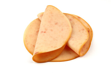 sliced cold smoked turkey breast isolated on white background. top view