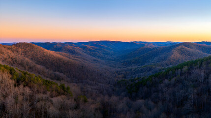 Obraz premium Panoramic View Of Mountain Valley At Sunset