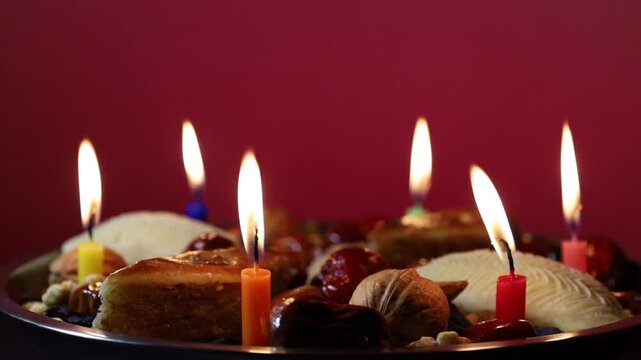 Spinning the Novruz holiday tray on a bard background