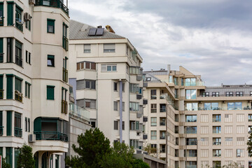  Modern apartment buildings in Podgorica, Montenegro with overcast sky in background