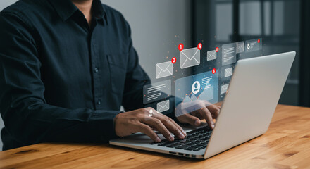 Managing a flood of emails, effortlessly navigating the digital inbox with calm focus, using a sleek laptop.