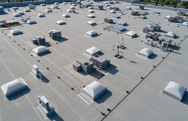 A large building with many vents and a roof