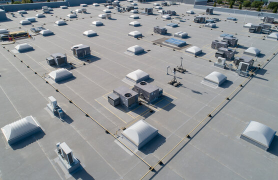 A large building with many vents and a roof