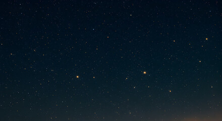 Fototapeta premium Enigmatic midnight canvas sprinkled with celestial gold dust and starlight