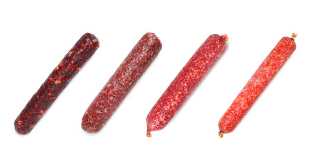Tasty smoked sausages on white background, set. Top view