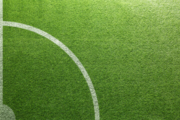 Football field with markings on green turf