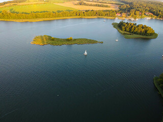 Aerial view of Mikolajskie lake near Mikolajki, Masurian Lake Land, August 2021 © marketanovakova