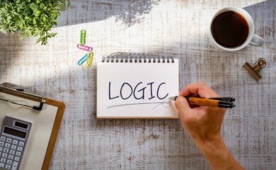 There is notebook with the word LOGIC. It is as an eye-catching image.