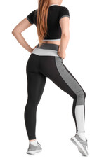 Young woman in sportswear on white background