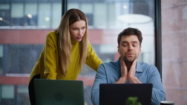 Professional trainer teaching intern dissatisfied work at laptop office closeup.