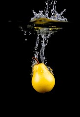 A yellow pear splashes into the water against a black background, creating dynamic droplets and ripples, highlighting freshness, vibrancy, and the beauty of motion in food photography.