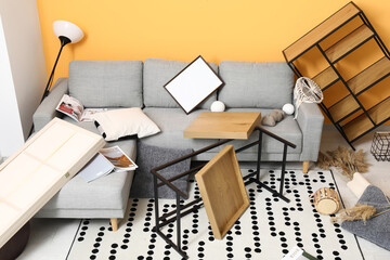 Interior of light living room after strong earthquake