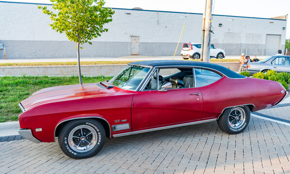 Park Ridge, Illinois, USA - August 22, 2024: Buick GS 400 outdoor. Retro car parked at auto show, side view. Buick GS 400 car. Classic car Buick GS 400 red color.