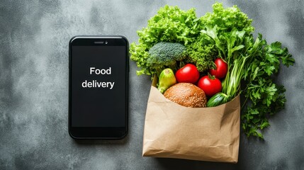 Food Delivery on Smartphone Display with Fresh Vegetables in a Paper Bag on Grey Stone Surface for Online Grocery Concept