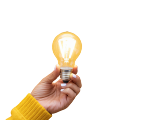 hand holding lit light bulb on white background